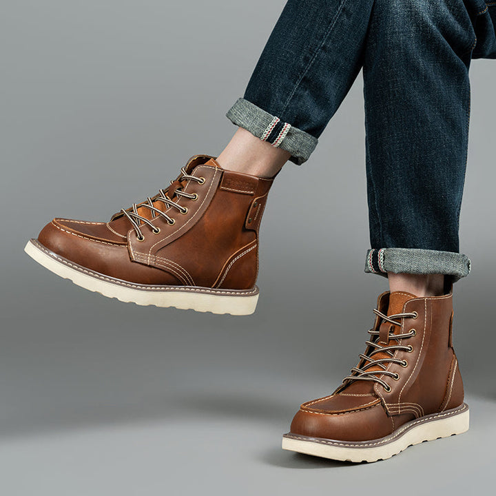 Men's ankle boots in black, waterproof chukka style, offering a sleek and casual appearance.