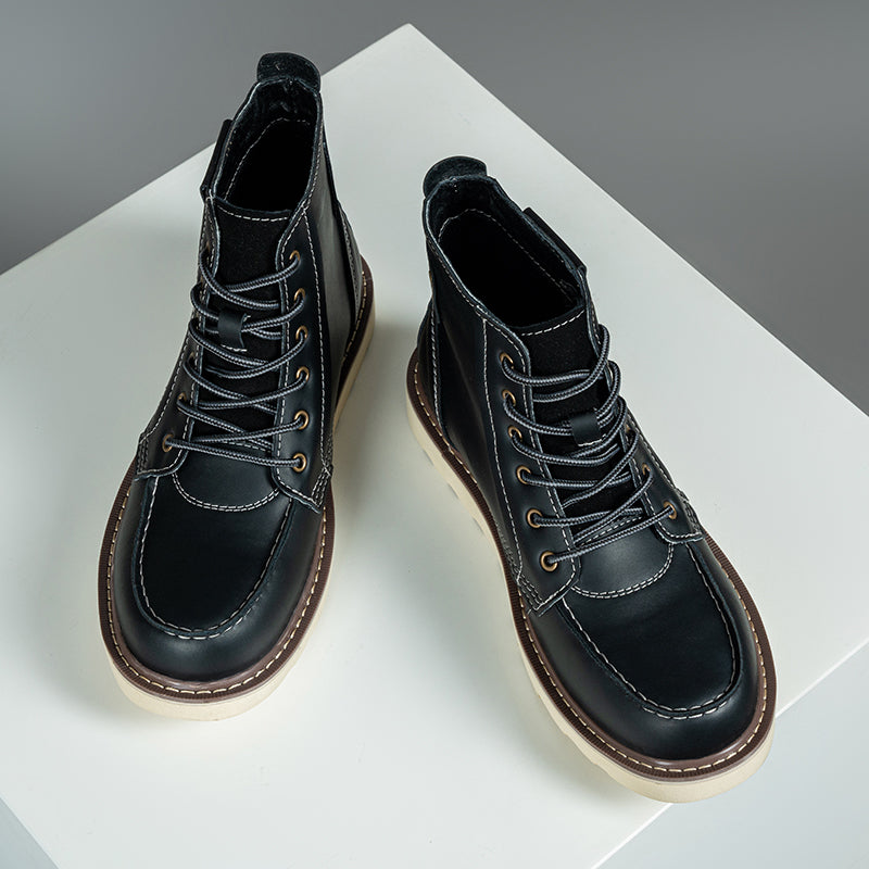 Elevated view of men's brown waterproof chukka boots, showcasing the textured leather and design.