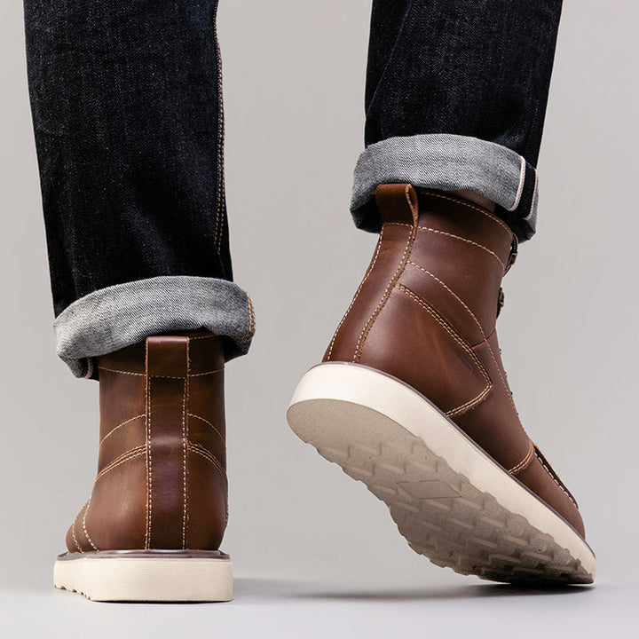Men's stylish brown chukka boots, waterproof and perfect for a relaxed yet polished casual ensemble.