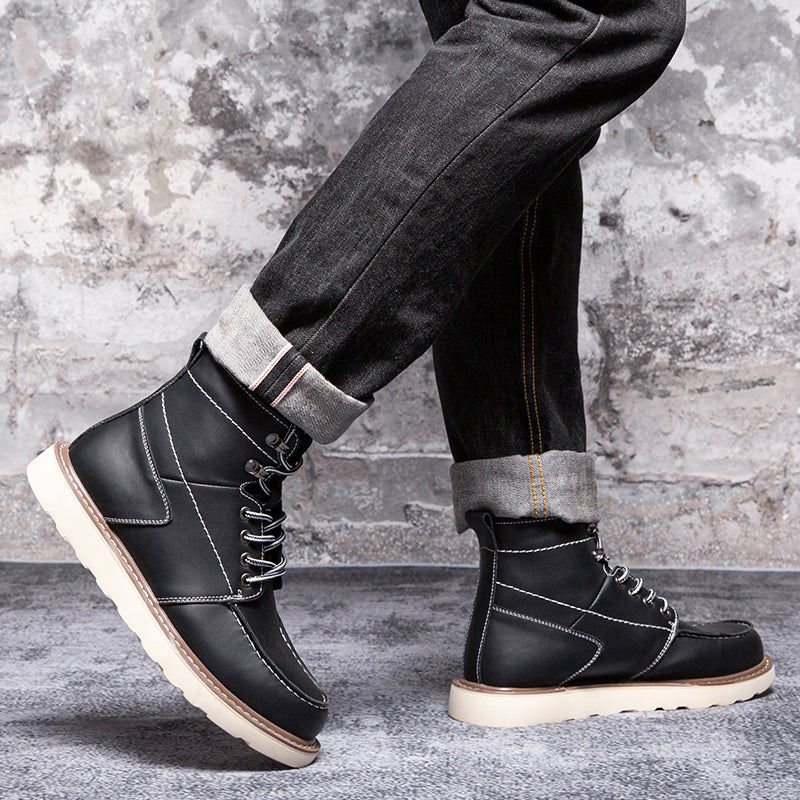 Men's black chukka boots, waterproof and offering a sleek, minimalist design for casual attire.