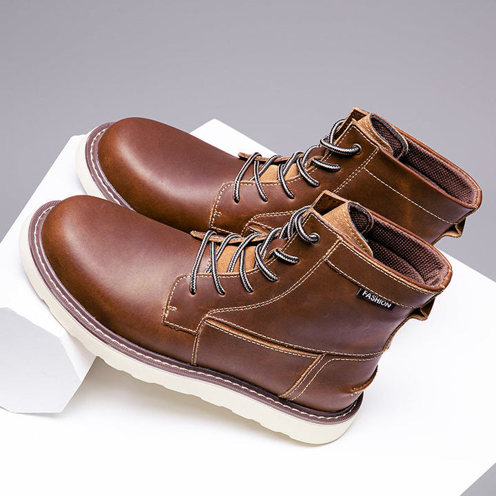 Men's waterproof brown chukka boots with detailed lacing, enhancing their casual aesthetic.