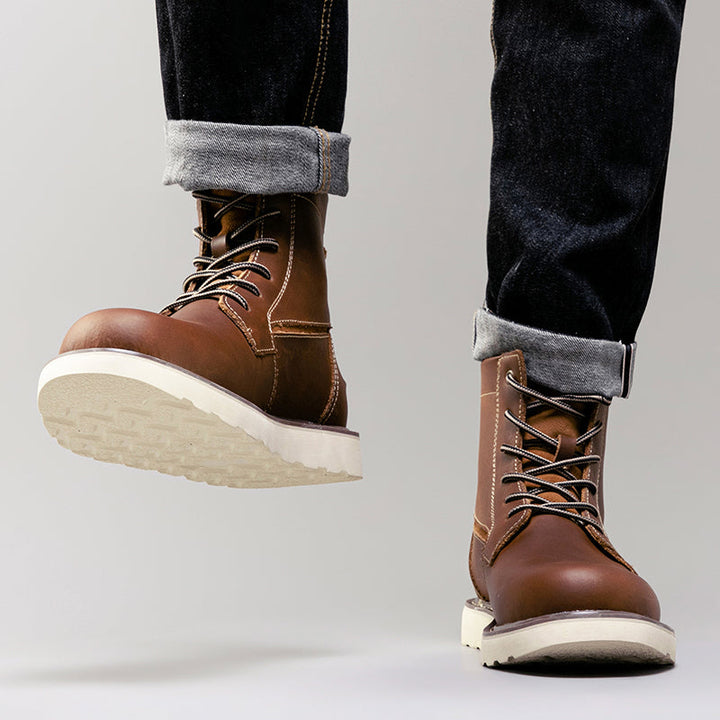 Men's black outdoor casual chukka boots, waterproof and reliable for damp weather conditions.