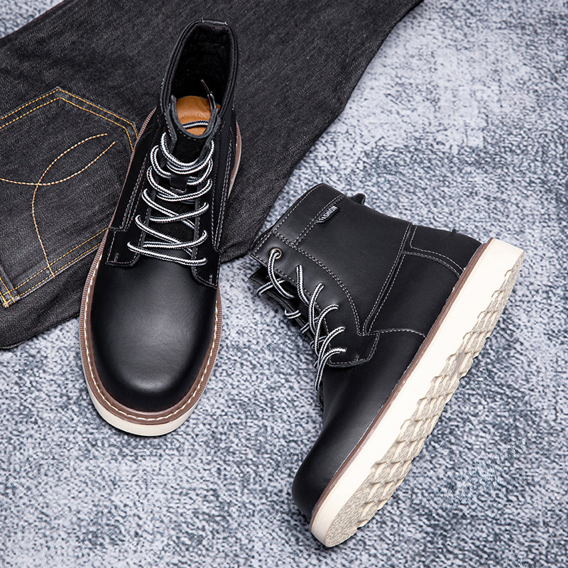Men's black chukka boots, waterproof, making them a practical and fashionable casual boot option.
