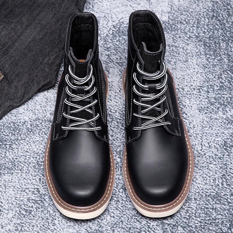 Men's black ankle boots, waterproof, chukka style, adding sophistication to casual ensembles.