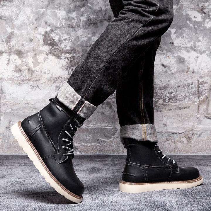 Men's black chukka boots, waterproof with cushioned insoles, ensuring comfort for casual strolls.