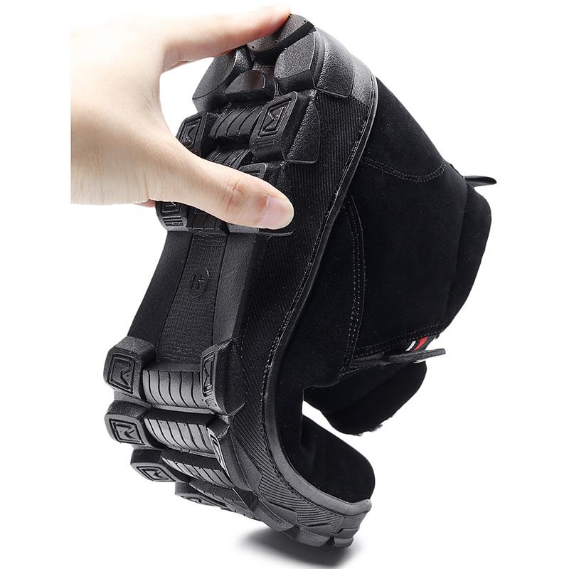 Pair of men's black waterproof snow boots, velvet-lined, against a cold winter background