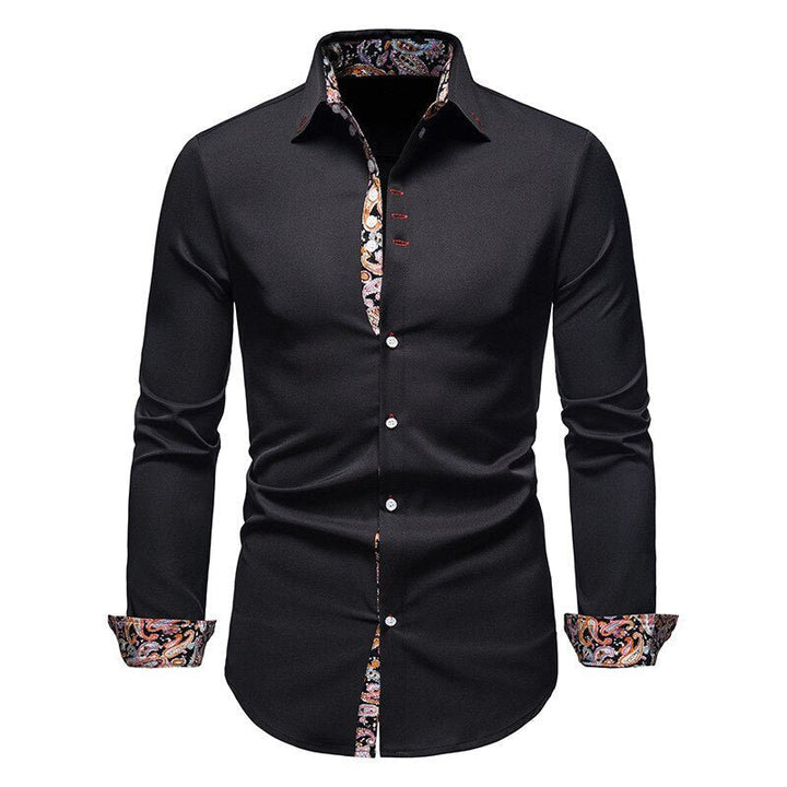Men's formal white shirt with contrasting patterned cuffs, versatile for various occasions.