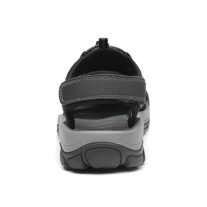 "Men's outdoor trekking sandals with mesh upper, breathable material, black color, durable sole, perfect for hiking adventure