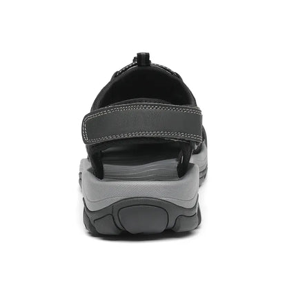 "Men's outdoor trekking sandals with mesh upper, breathable material, black color, durable sole, perfect for hiking adventure