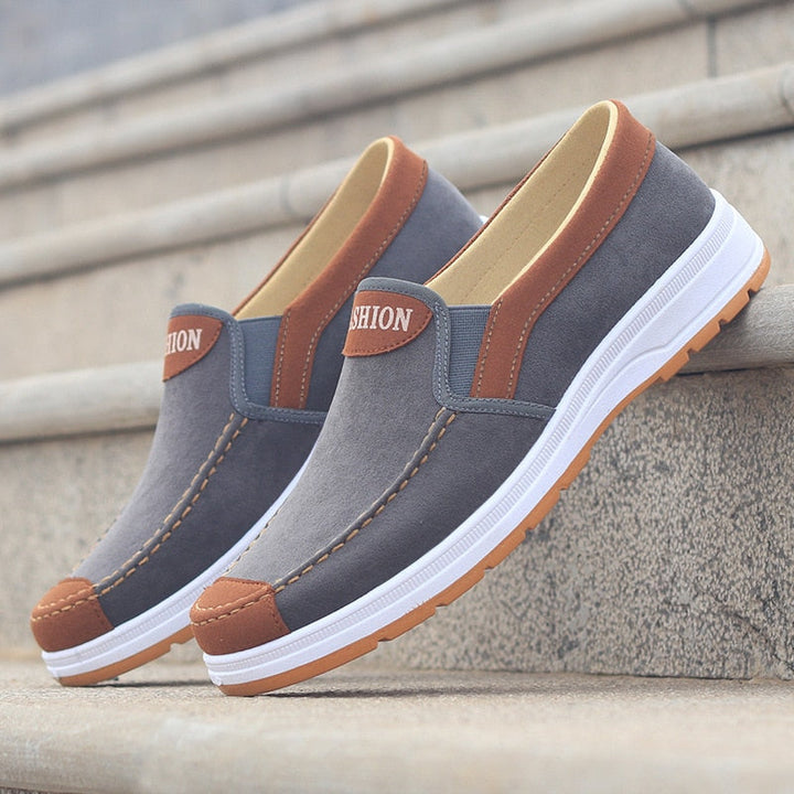 Comfortable men's walking shoes, Matteo canvas slip-ons for daily wear.