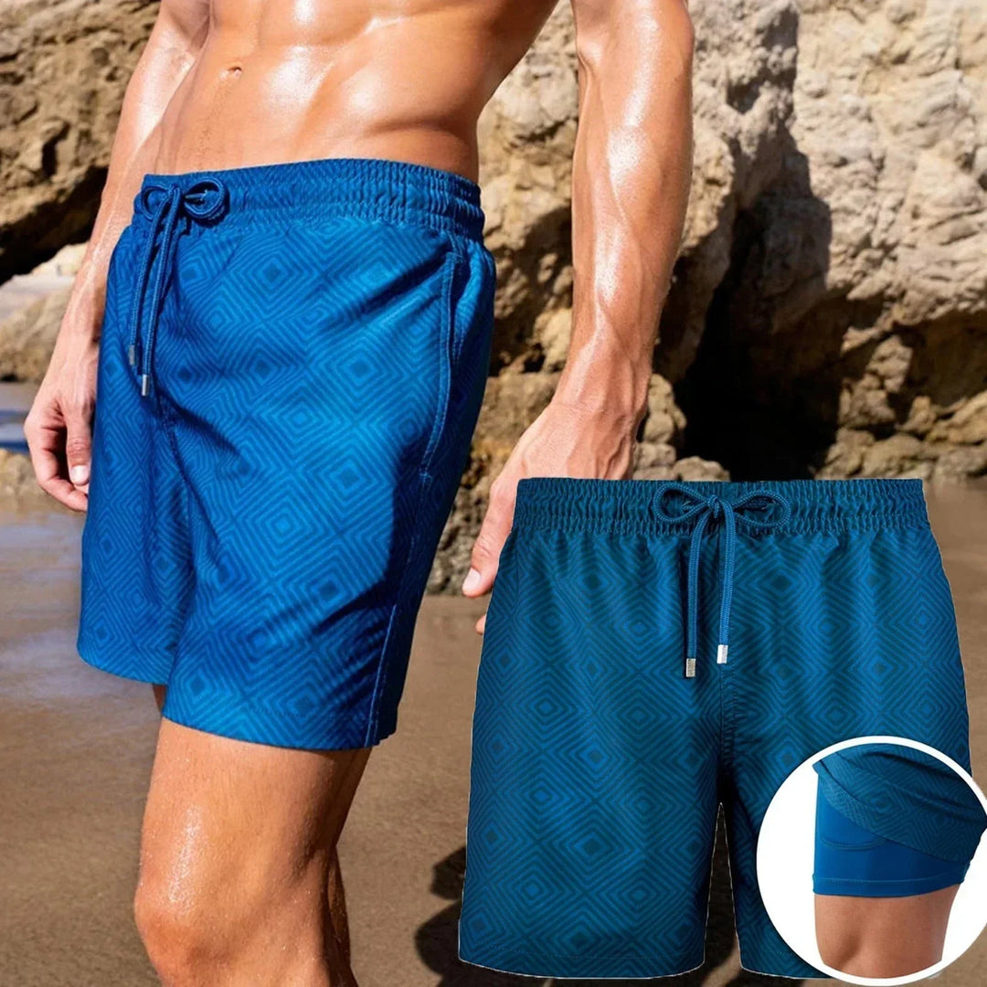 Athletic men's 2-in-1 swim shorts with quick-dry fabric & compression inner brief. Perfect for swimming, gym, and sport.