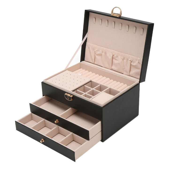Close-up of luxurious leather texture on an elegant 3-tier jewelry storage organizer for women.