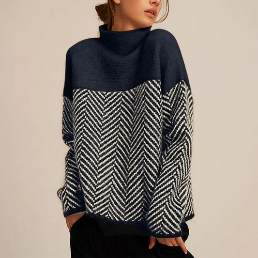 Navy blue herringbone knit sweater with stand-up collar, soft texture, relaxed fit. Women's hoodies and sweaters collection.