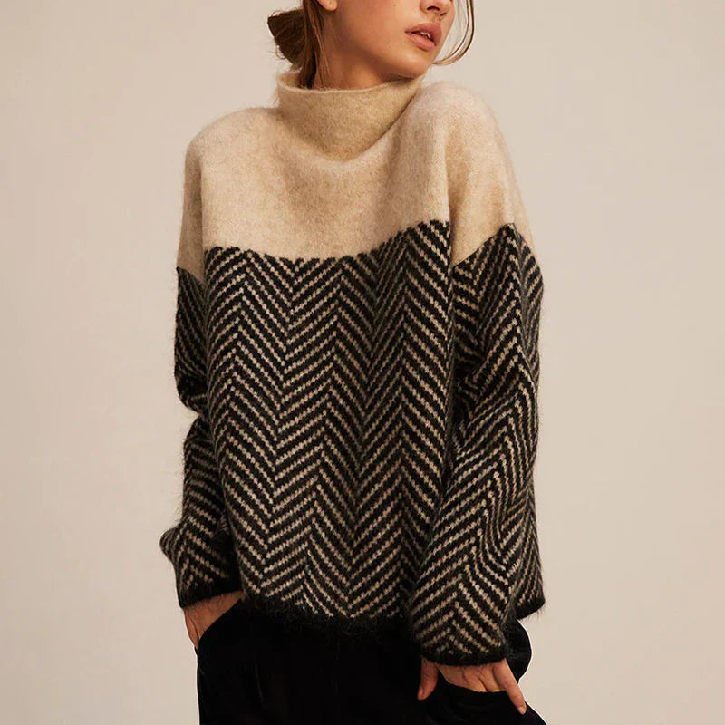 Navy blue herringbone knit sweater with stand-up collar, soft texture, relaxed fit. Women's hoodies and sweaters collection.