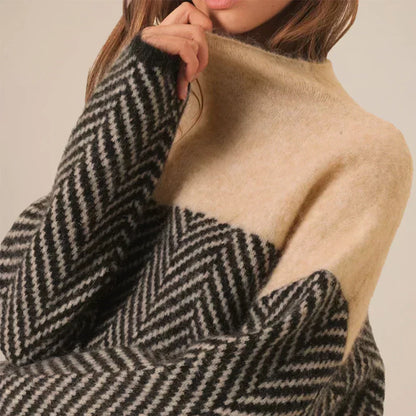 Navy blue herringbone knit sweater with stand-up collar, soft texture, relaxed fit. Women's hoodies and sweaters collection.