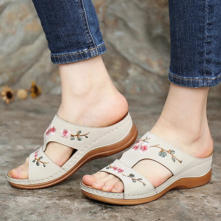 Feel relief with Florina women's orthopedic floral sandals, designed for arch support & ultimate comfort.