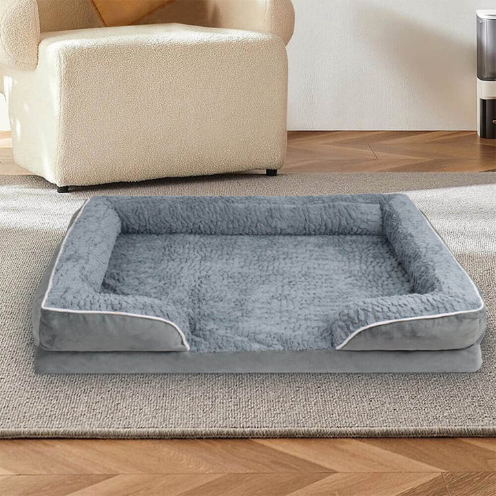 Durable, washable, water-repellent brown orthopedic dog bed providing full surround support for pet comfort.