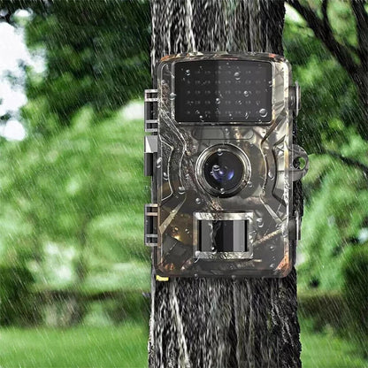 "Outdoor night vision wildlife trail camera capturing nocturnal wildlife with 16MP photos and HD videos in rugged terrain."
