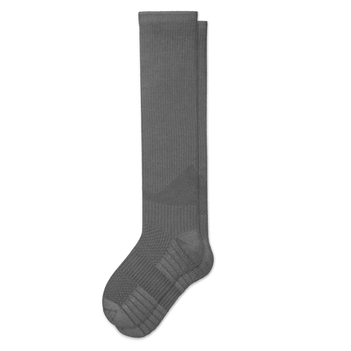 Close-up of the fabric texture of gray gentle compression socks, ideal for circulation.