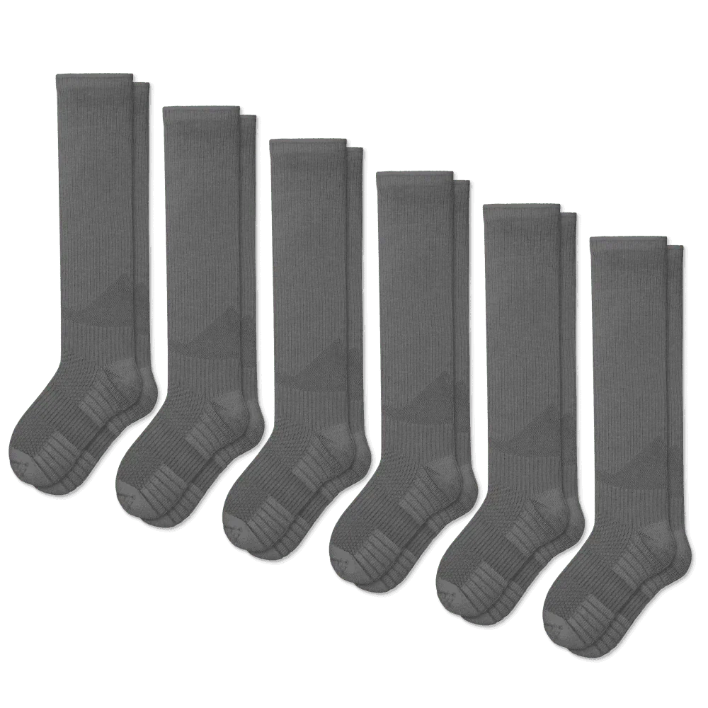 Folded gray unisex gentle compression socks, perfect for improved circulation and daily wear.