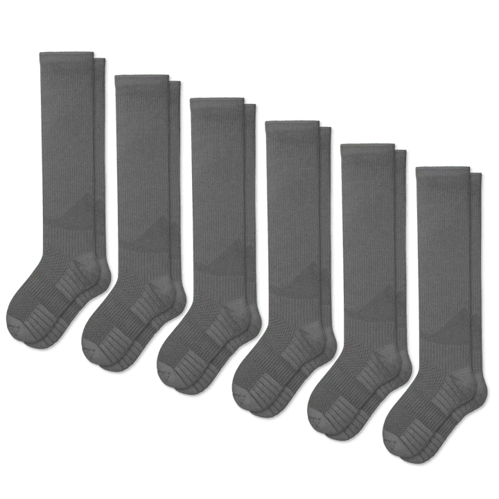 Folded gray unisex gentle compression socks, perfect for improved circulation and daily wear.