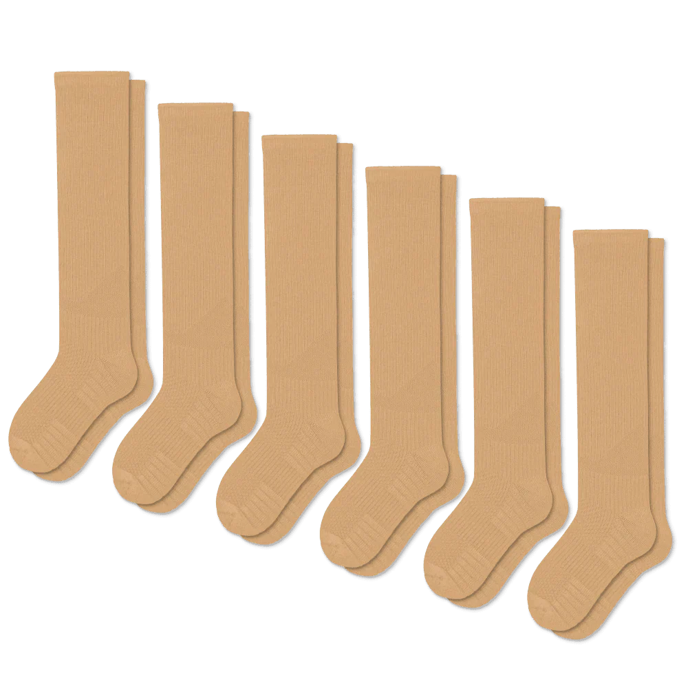 Unisex tan compression socks, designed for gentle support, promoting circulation and all-day comfort.