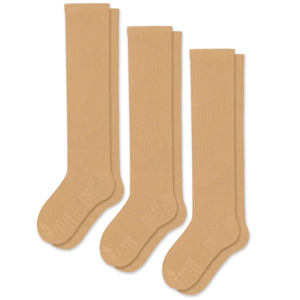 View of tan unisex compression socks, perfect for daily wear, offering gentle support for leg health.