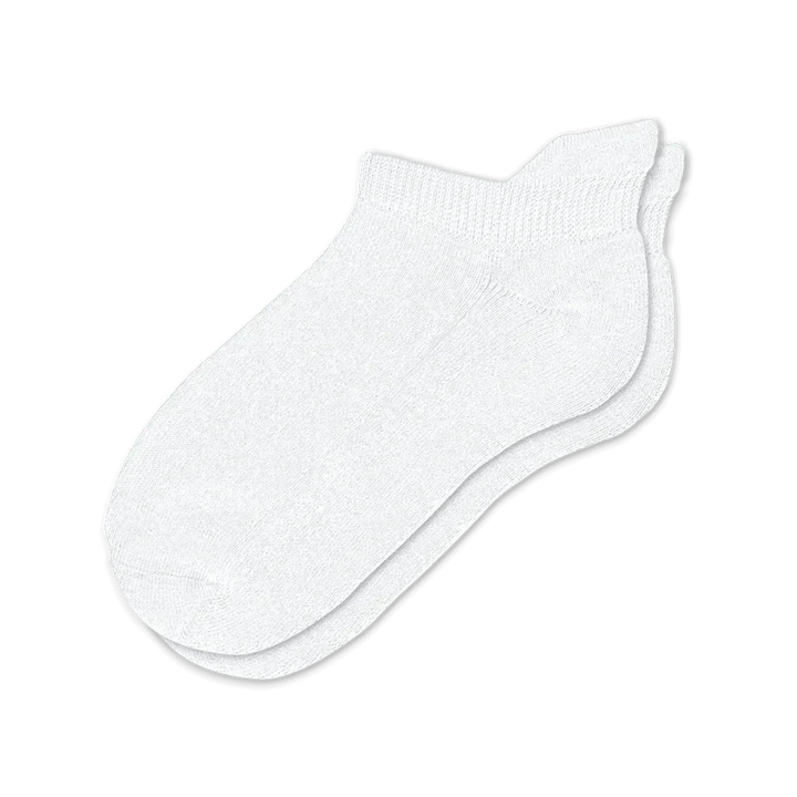 White comfort compression socks paired with athletic shoes, demonstrating their use for active all-day wear.