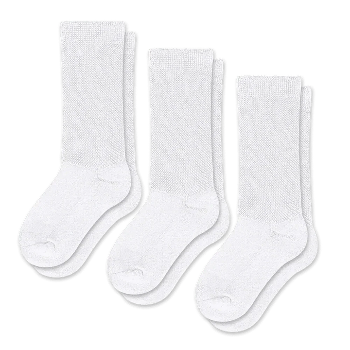 White compression socks, folded neatly, displaying their soft texture and readiness for all-day wear.