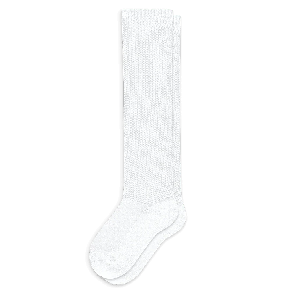 Detail of the heel and ankle area of white compression socks, designed for optimal circulation support.
