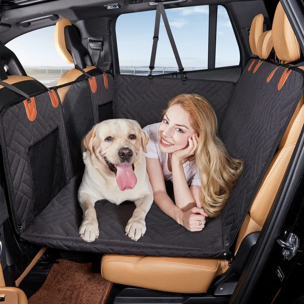 "Pet car seat extender with hard base, adjustable straps, side walls, for medium-large dogs in vehicle backseat."