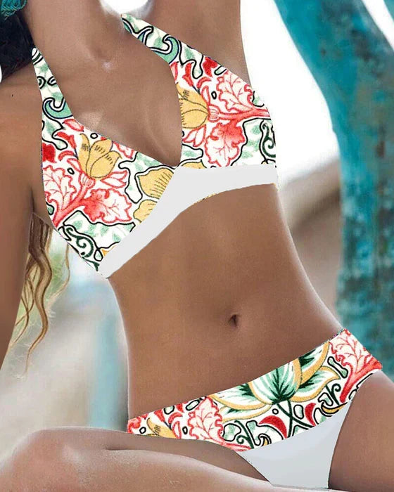Trendy two-piece floral & polka dot bikini, perfect women's swimwear for vacation.