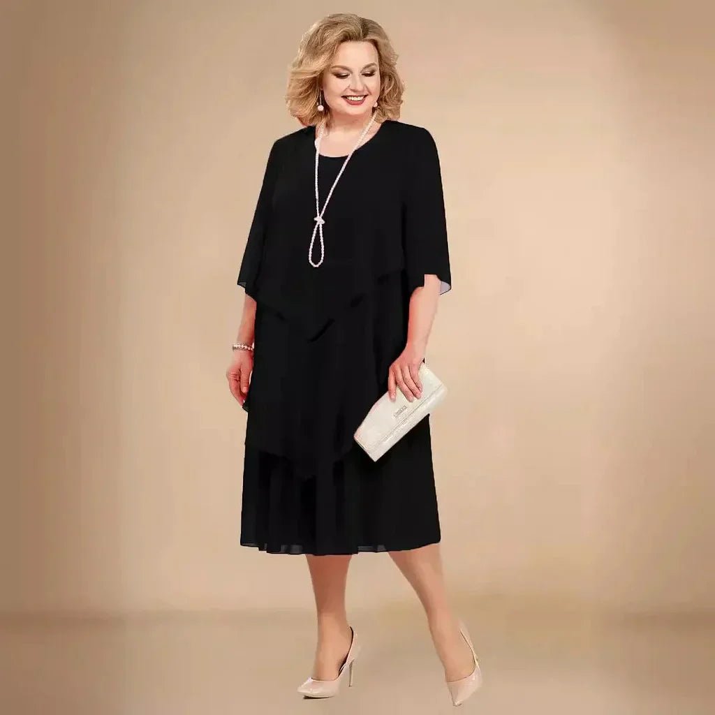 Plus size women's elegant layered asymmetrical chiffon dress, perfect for wedding guests or parties.