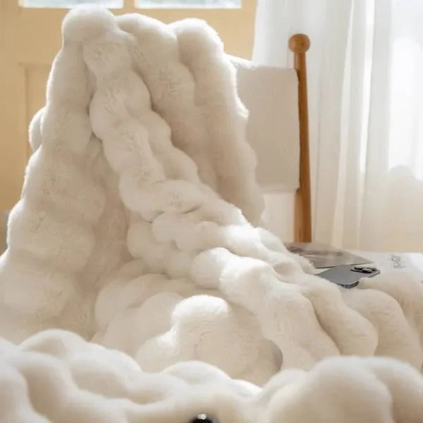 "Plush faux fur throw blanket in rich, elegant colors, ideal for winter warmth and stylish decor accents."