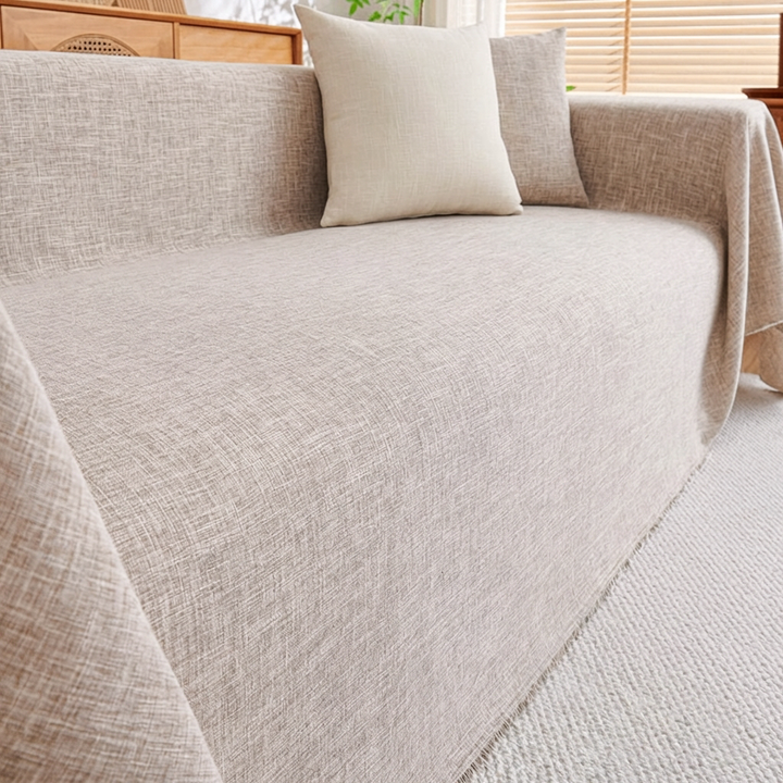 Washable cotton linen L-shape sectional sofa cover in grey, a pet-friendly furniture protector for modern living rooms.