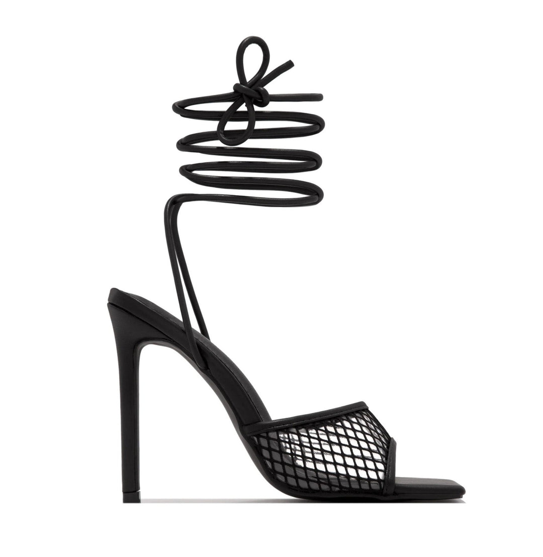 Chic women's lace-look pumps. Pointed toe, block heel. Versatile footwear for party, dress, & everyday elegance.