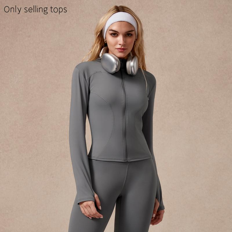 Blue women's gymwear top, full-zip design, sculpted for performance and comfort during athletic activities.