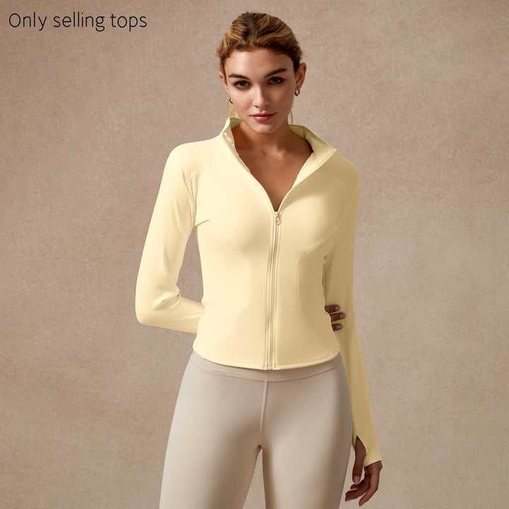 Purple women's performance full-zip top with a sculpted fit, versatile gymwear for any workout intensity.