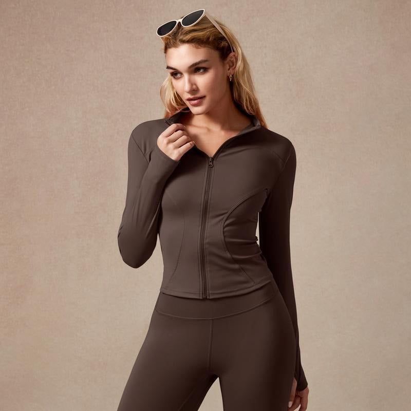 Gray women's sculpted activewear top with full-zip, designed for peak performance and ultimate comfort.
