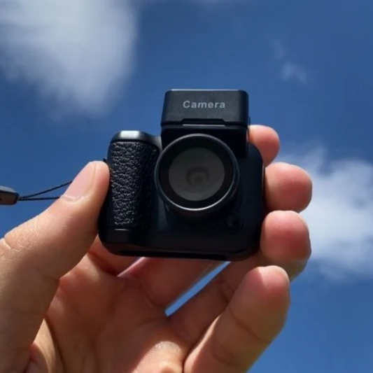 "Retro-inspired mini digital camera with vintage design, compact size, and modern features, perfect for travel photography."