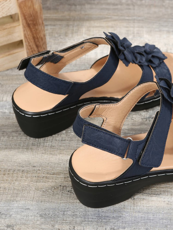Vintage-inspired women's wedge sandals offering orthopedic comfort for all-day summer wear.