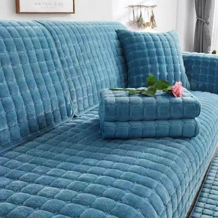 Soft, scratch-resistant flannel sofa cover with anti-slip design for universal furniture protection.
