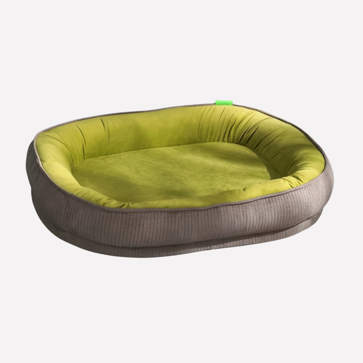 Ultimate comfort dog bed featuring a supportive nest design and a fully washable, soft plush cover.