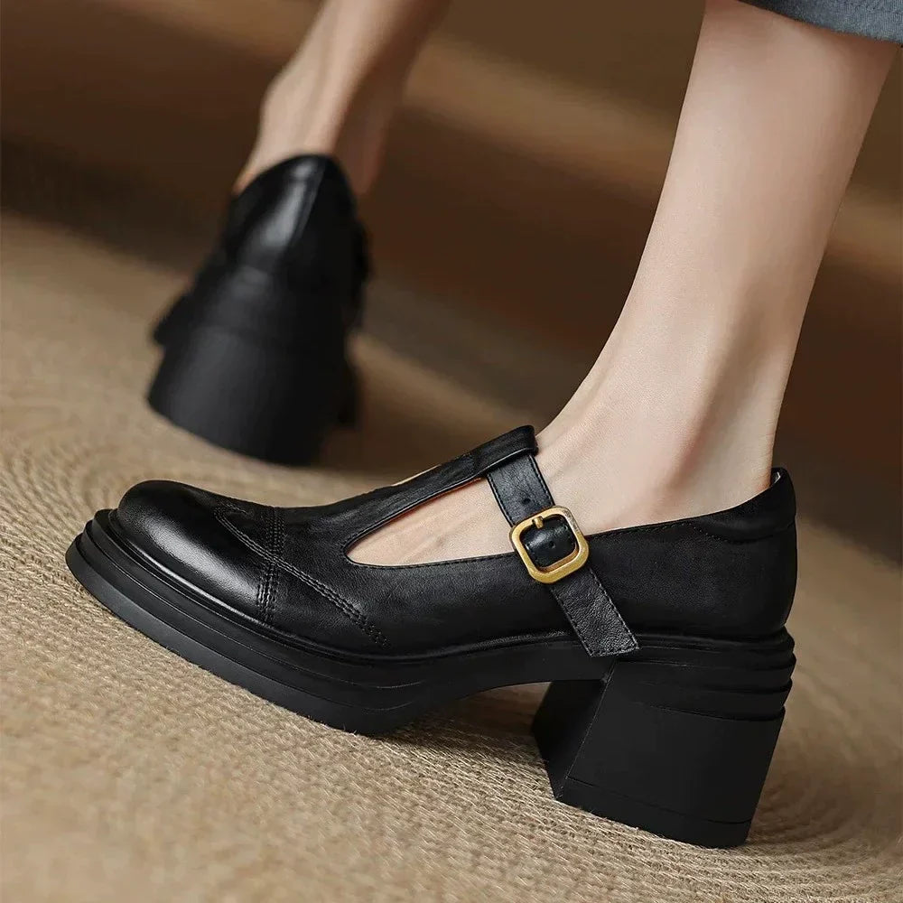 Sophisticated women's black leather T-strap block heel shoes, perfect for workwear & elegant fashion.