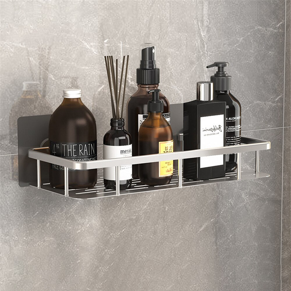 Modern black metal suction utility shelf for bath accessories & shower organization.