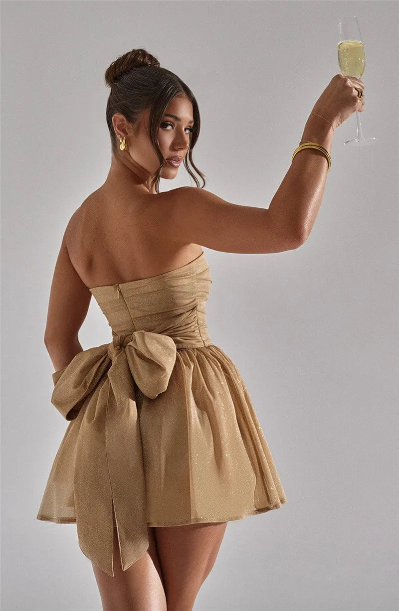Fashionable women's sparkling mini dress, perfect for party, evening, or special occasions. Fitted style.