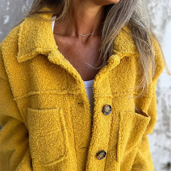 Elegant women's jacket featuring a sophisticated lapel collar for versatile autumn fashion.