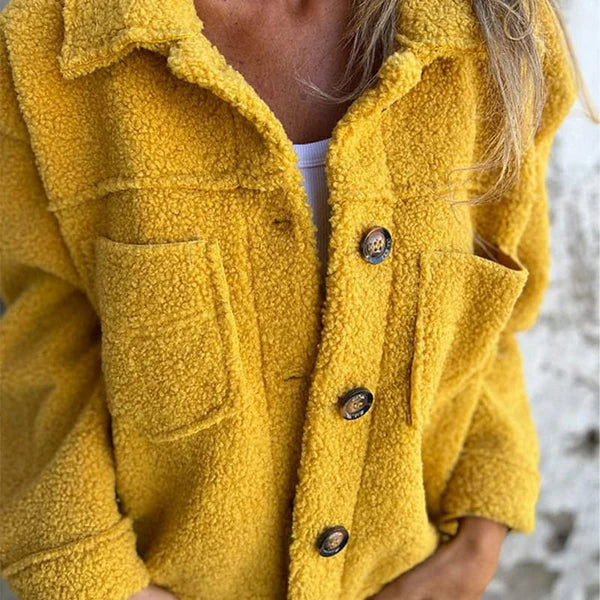 Fashionable women's outerwear: a versatile lapel collar jacket for elegant autumn looks.