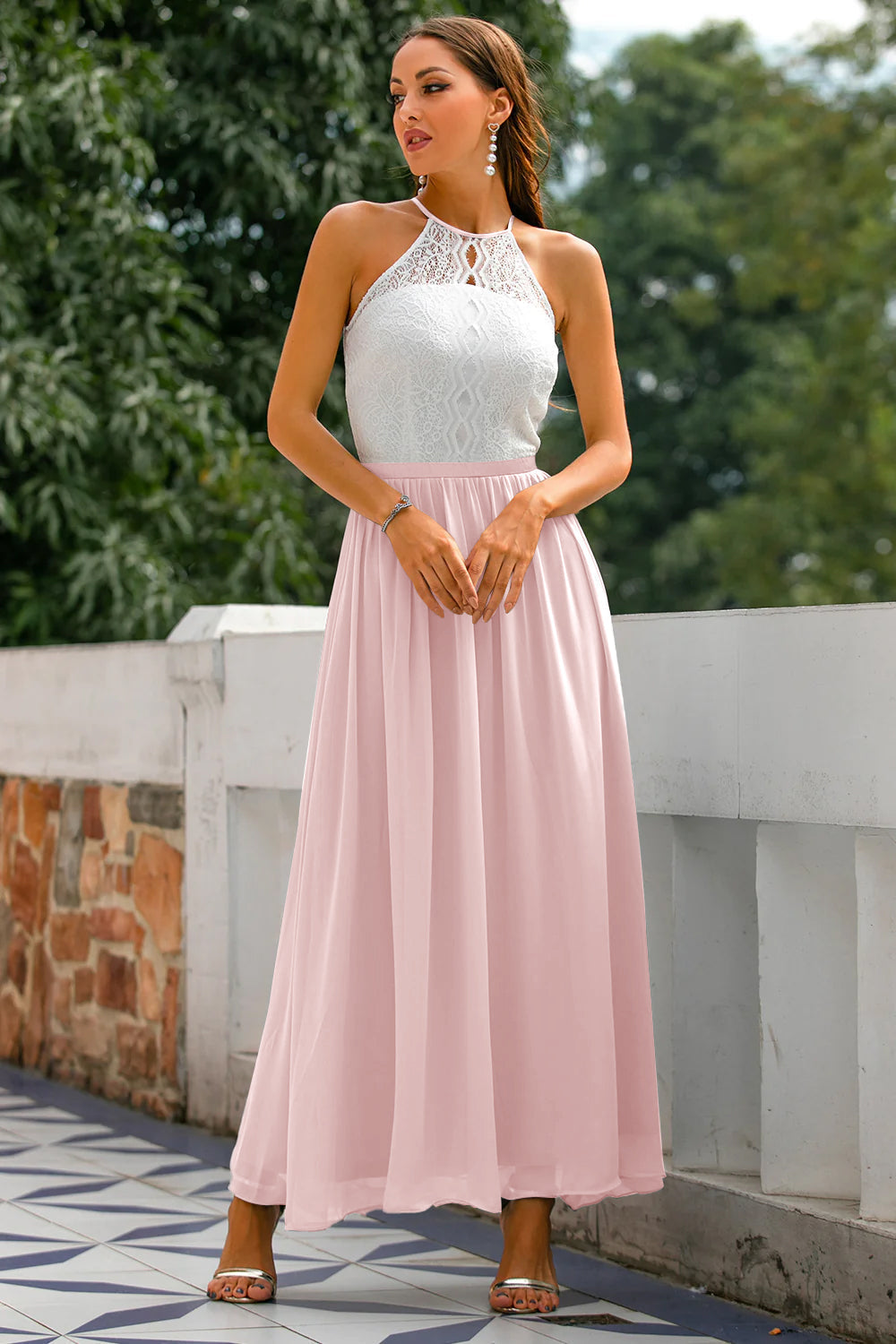 Long, elegant women's halter maxi dress. Floor-length formal gown perfect as a wedding guest dress or party outfit.