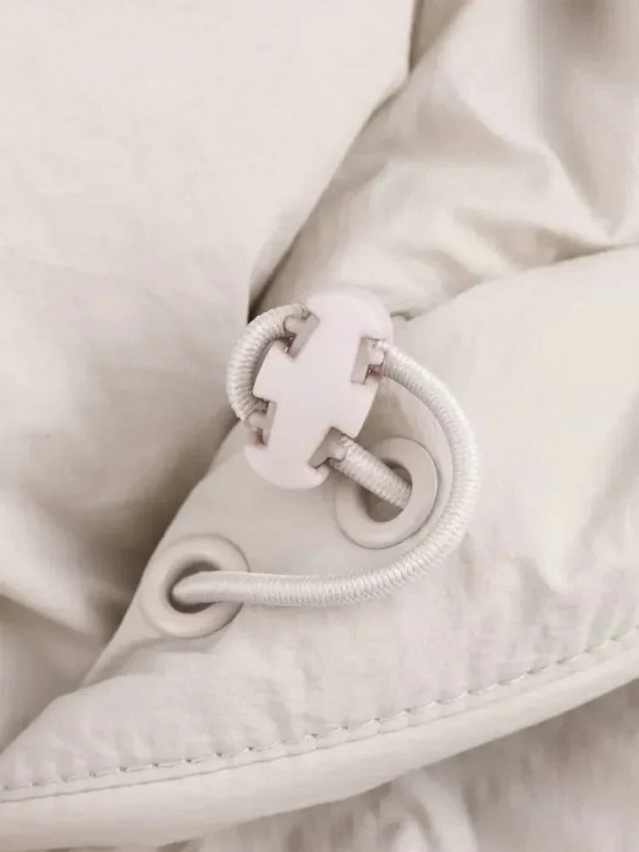 White cropped insulated puffer jacket for women, a versatile and essential piece of winter outerwear